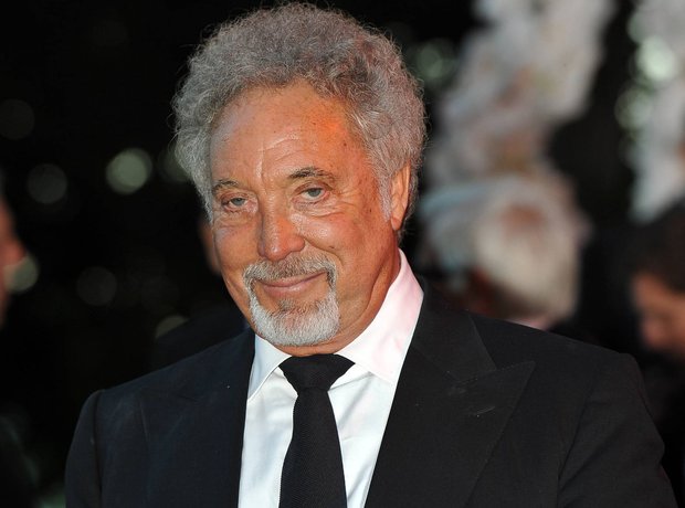 2. Who did Tom Jones team up with on the song Burning Down The House in ...